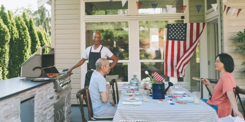 Homeowners enjoying their outdoor kitchen
